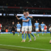 Arsenal lose 2-1 to Manchester City as title race tightens