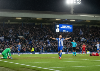 Ipswich seize promotion advantage after late penalty secures crucial point