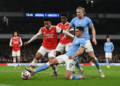 Arsenal face Man City title test after attack woes in Champions League