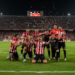 Sevilla climbs out of relegation zone as Alexis Sánchez rescues victory