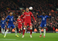 Liverpool aim to seal Champions League spot against crisis-hit Chelsea at Anfield