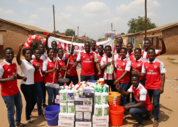 Arsenal supporters in Mzuzu donate K3 million cleaning gear after title parade