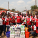 Arsenal supporters in Mzuzu donate K3 million cleaning gear after title parade